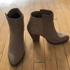 Tan booties with gold zippers